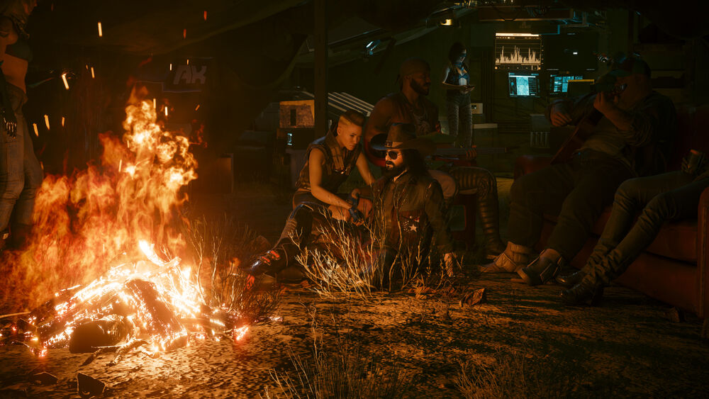Обои для рабочего стола Посиделки у костра в лагере Альдекальдо из игры Cyberpunk 2077