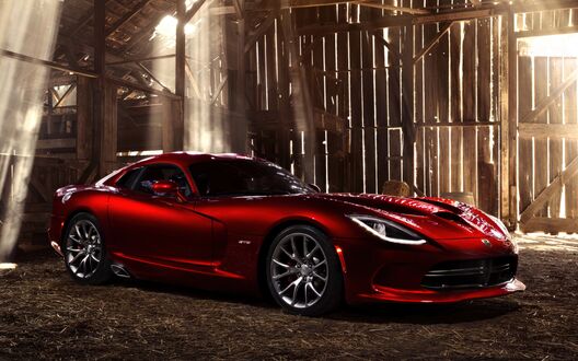 Обои на рабочий стол Красный спортивный автомобиль Dodge Viper SRT в ангаре