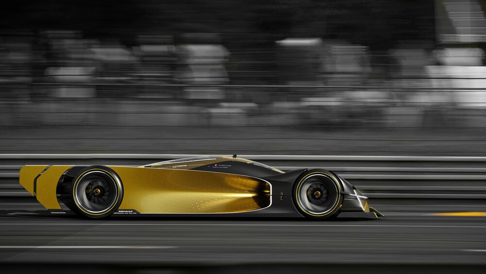 Обои для рабочего стола Футуристический золотой и черный автомобиль Renault Le Mans Concept Car Design мчится по гоночной трассе, создавая эффект движения, на фоне размытых черно-белых трибун
