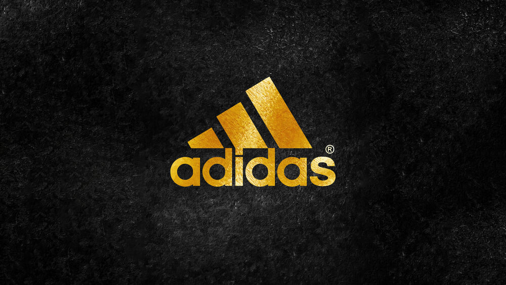 Обои для рабочего стола Логотип фирмы Adidas на черном фоне