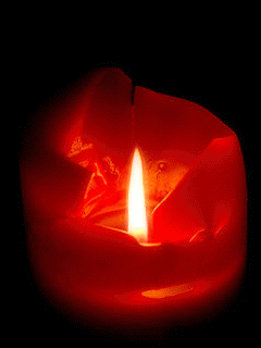 Фото Горящая свеча красного цвета