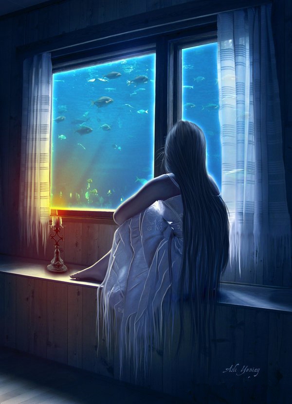 Фото Девушка сидит у окна смотря на рыб