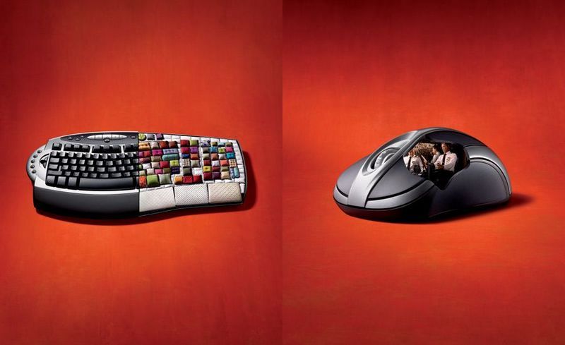 Фото Неожиданные фантазии - около разноцветной клавиатуры разъезжает компьютерная мышка с водителем и пассажиром