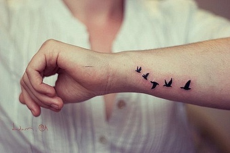 Значение тату птицы на руке