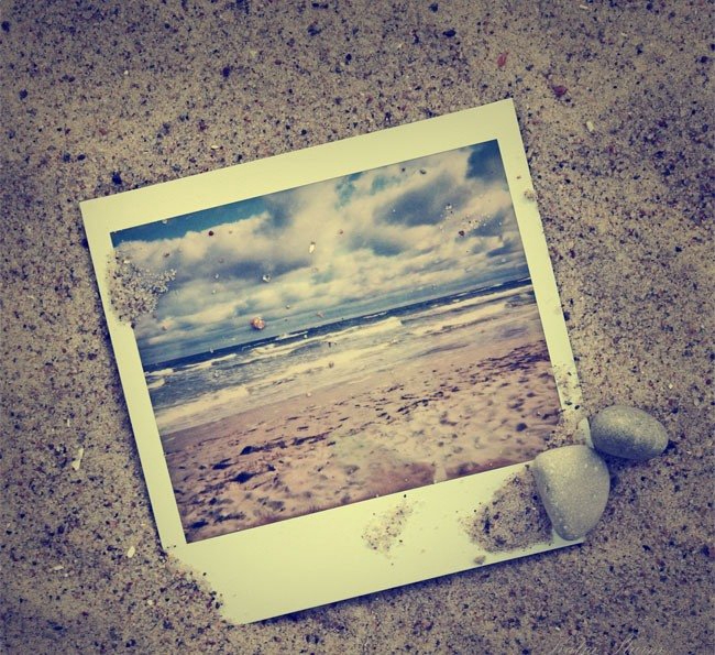 Фото Фотография моря лежит на песке