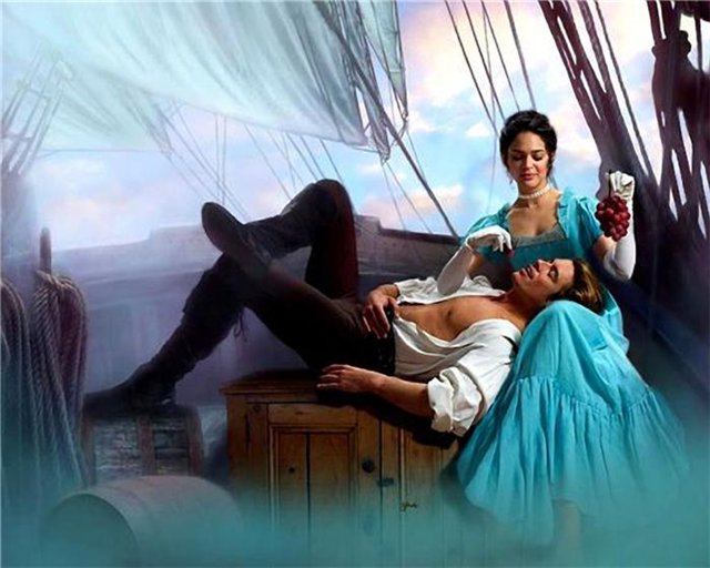 Фото Мужчина с женщиной на корабле в море, она кормит его виноградом