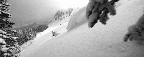 Фото Лыжник, съезжающий с гор