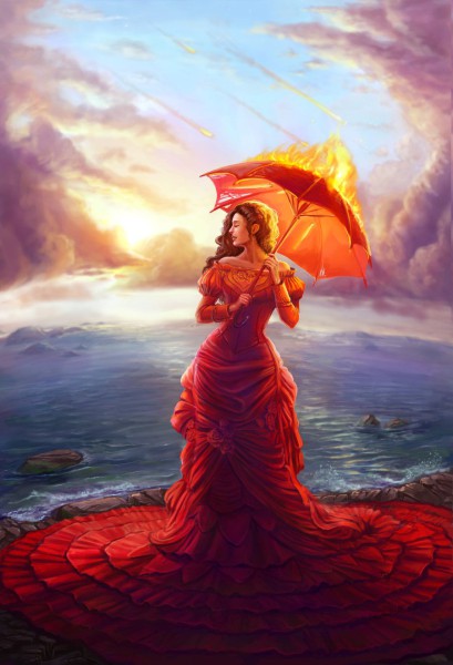 Фото Девушка в длинном красном платье стоит с горящим красным зонтом на фоне моря