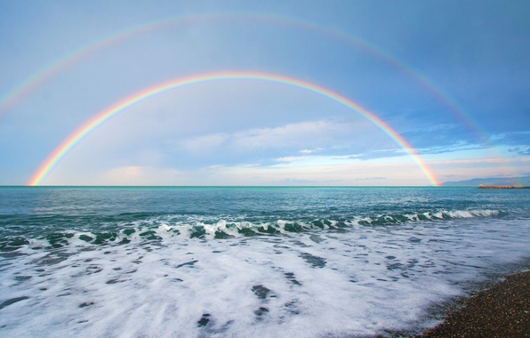 Фото Двойная радуга над морем