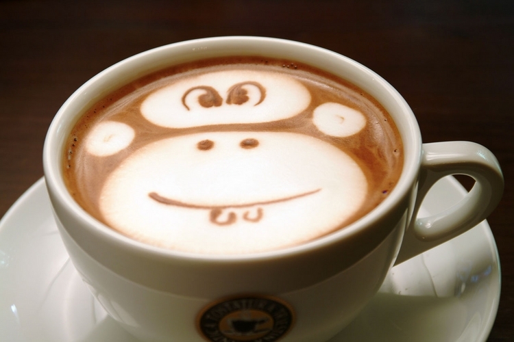 Фото Морда обезьяны из пенки на кофе