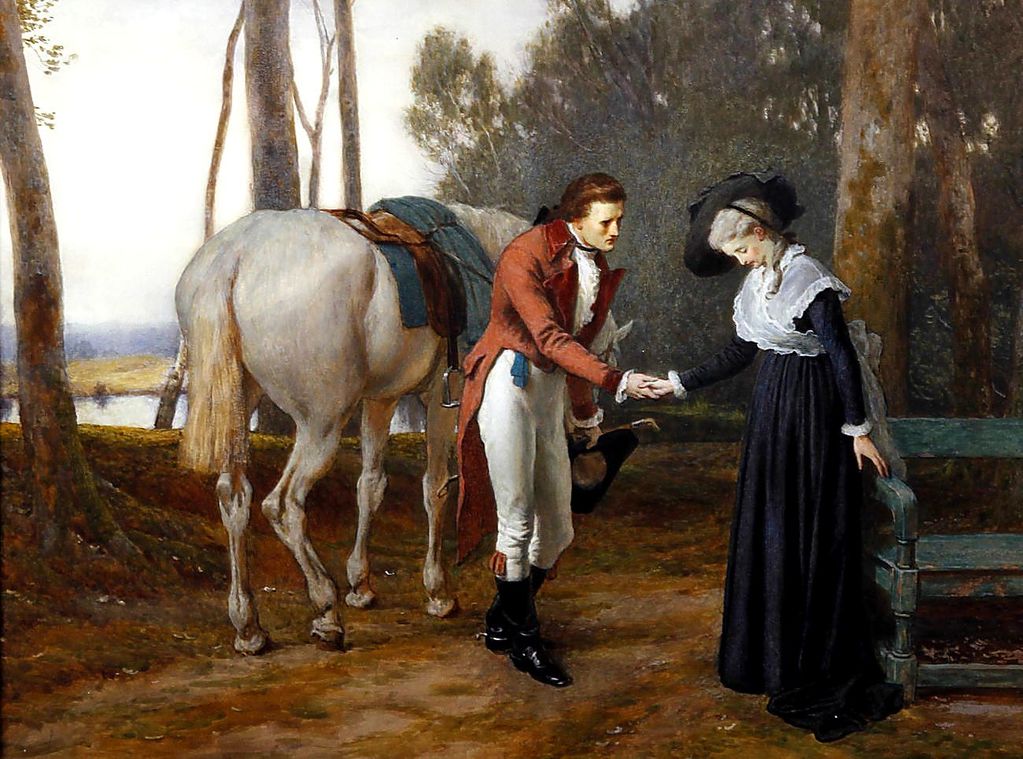 Фото Мужчина что-то спрашивает у женщины, рядом стоит лошадь