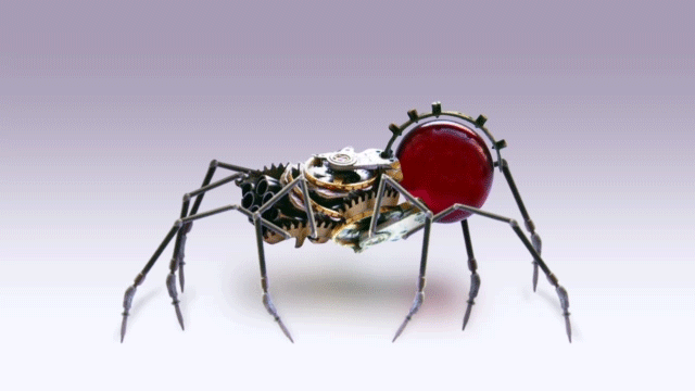 Фото Механический паук на белой поверхности