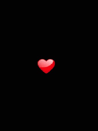Фото Красное сердце на черном фоне, взрывающееся на десятки маленьких  красных сердечек