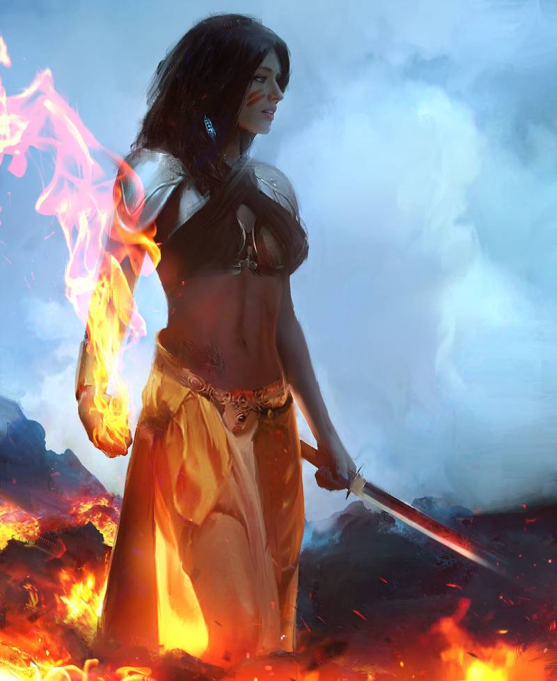 Фото Девушка с мечом в одной руке и с пылающей другой рукой стоит среди огня