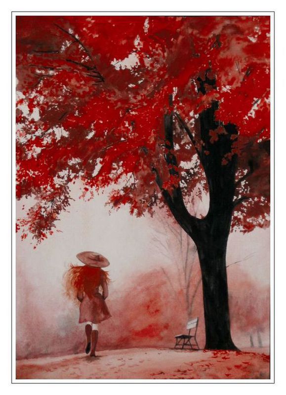 Фото Рыжеволосая девушка в красном плаще и красной широкополой шляпе, идет по осенней аллее под деревьями с красной осенней листвой