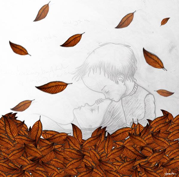 Фото Мальчик целует девочку под падающей листвой