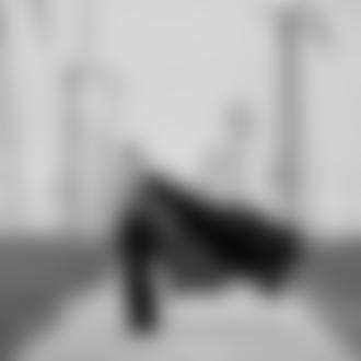 Фото Девушка с обнаженной грудью в развевающихся черных одеждах идет по дороге мимо ветряных установок, by Marina Stenko (Марина Стенько)