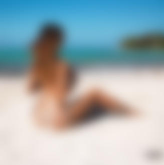 Фото Обнаженная девушка сидит на песке, фотограф MAVRIN