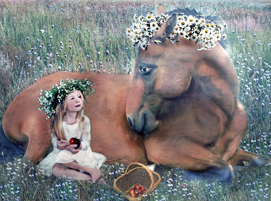 Фото Девочка в веночке из цветов сидит возле лежащей лошади в венке из цветов