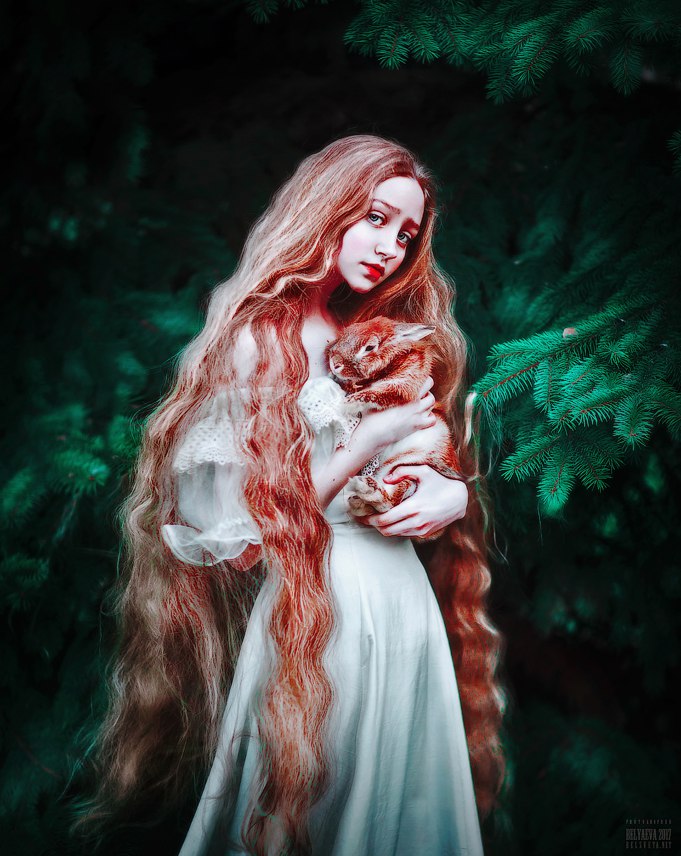 Фото Девушка с длинными волосами и кроликом на руках, фотограф Светлана Беляева