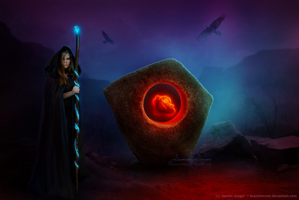 Фото Девушка-колдунья с волшебным посохом стоит у камня, внутри которого светится красная роза, by Jasmin Junger