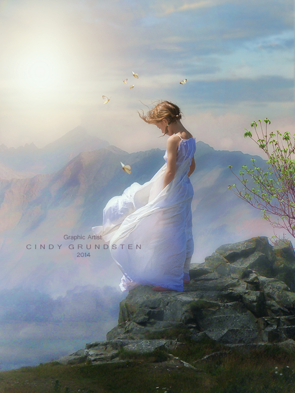 Фото Девочка в белом длинном платье, опустив голову вниз стоит на камне на краю обрыва, рядом с ней летают бабочки на фоне горного пейзажа, by Cindy Grudsten