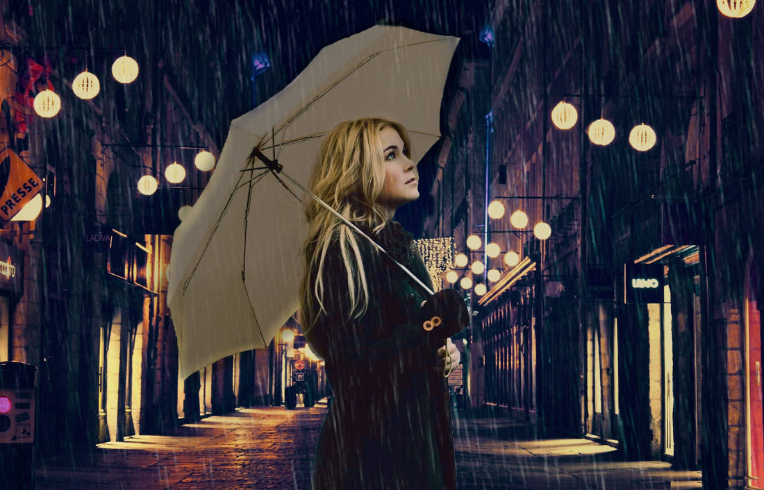Фото Девушка с зонтом под дождем на фоне ночного города