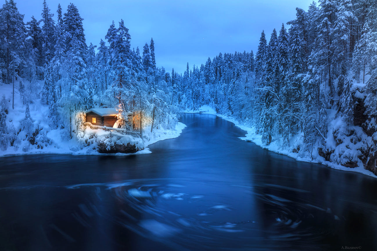 Фото Ночной домик в снежном лесу в Финляндии, фотограф Andrew Bazanov