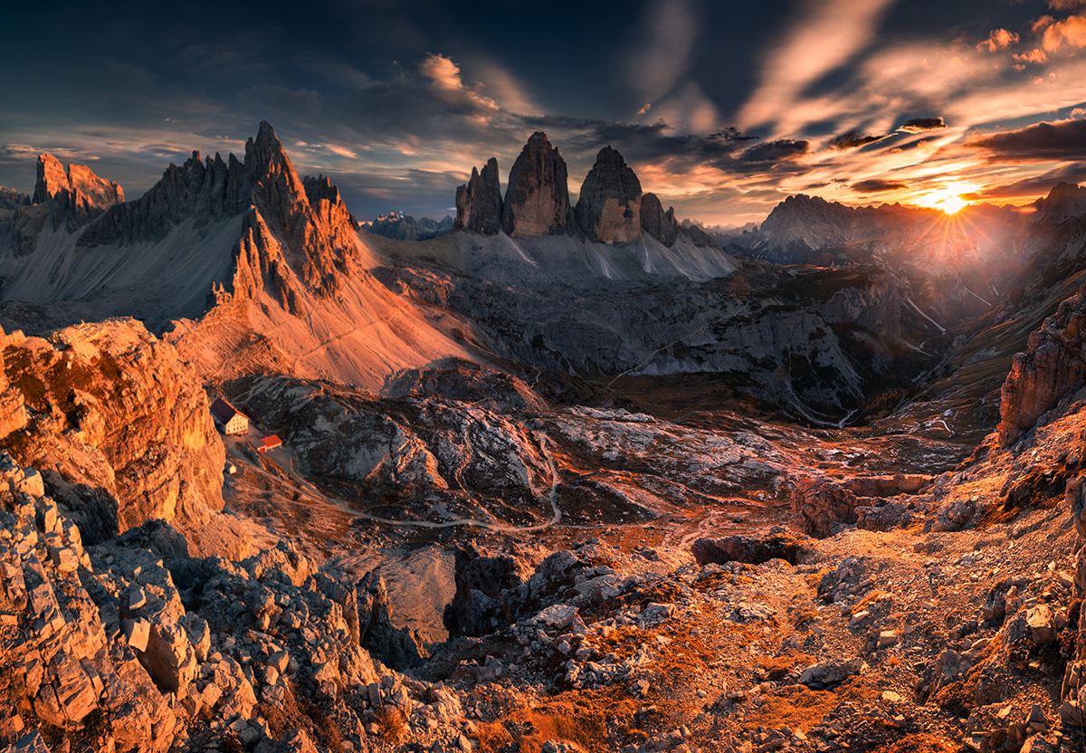 Фото Закат на горном массиве Tre Cime Di Lavaredo / Тре-Чиме-ди-Лаваредо. Фотограф Karol Nienartowicz