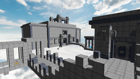 Фото Огромное строение с двумя пешеходными мостиками из кубоблоков-монолитов на фоне дневного облачного неба и парящее в нем