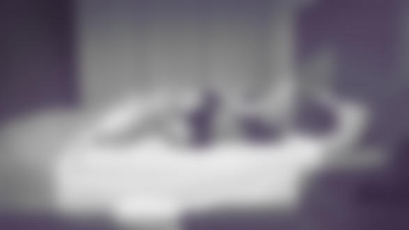 Фото Девушка в нижнем белье с телефоном в руке лежит на постели, by Krystopher Decker