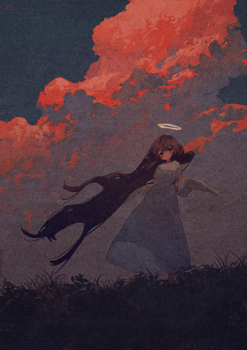 Фото Девушка-ангел стоит в траве