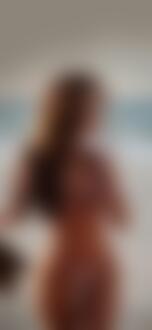Фото Модель Amanda Taylor / Аманда Тейлор в купальнике на фоне побережья