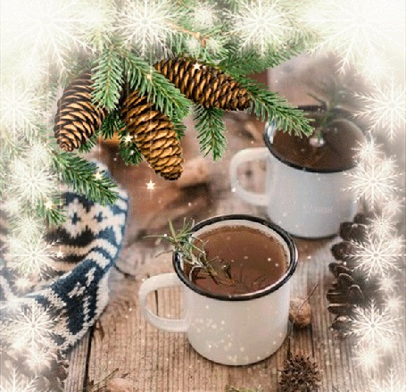 Анимация Кружки с чаем на деревянном столе рядом с шишками