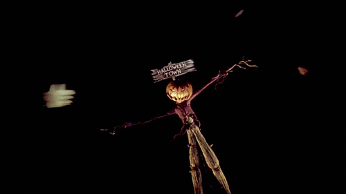 Анимация Чучело со светящейся надписью (Halloween town / Город Хеллоуина) летает в воздухе, гифка Чучело со светящейся надписью (Halloween town / Город Хеллоуина) летает в воздухе