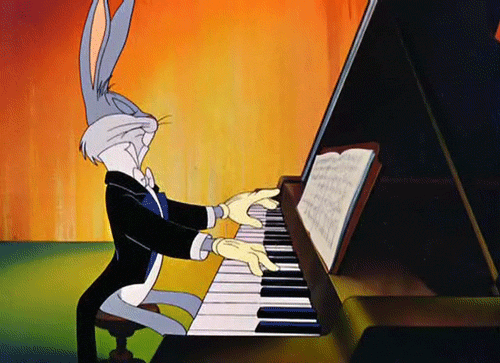Анимация Кролик Bugs Bunny / Багз Банни из одноименного мультфильма играет на фортепиано, гифка Кролик Bugs Bunny / Багз Банни из одноименного мультфильма играет на фортепиано