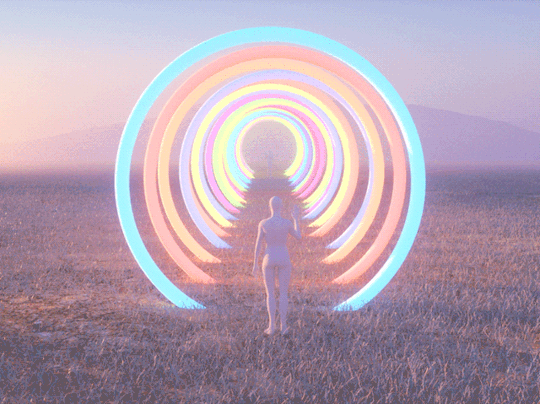 Анимация Человек, стоящей в траве, управляет разноцветными кольцами, образующими туннель, гифка