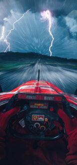 Обои на телефон Гоночный автомобиль Ferrari стремительно движется вперед, окруженный молниями и дождем (Marlboro Momo)