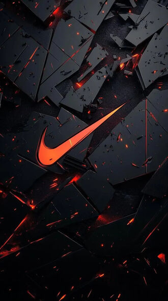 обои на телефон Оранжевый логотип Nike с красным свечением на переднем плане, на фоне темной разрушенной поверхности с множеством острых фрагментов и красными светящимися трещинами